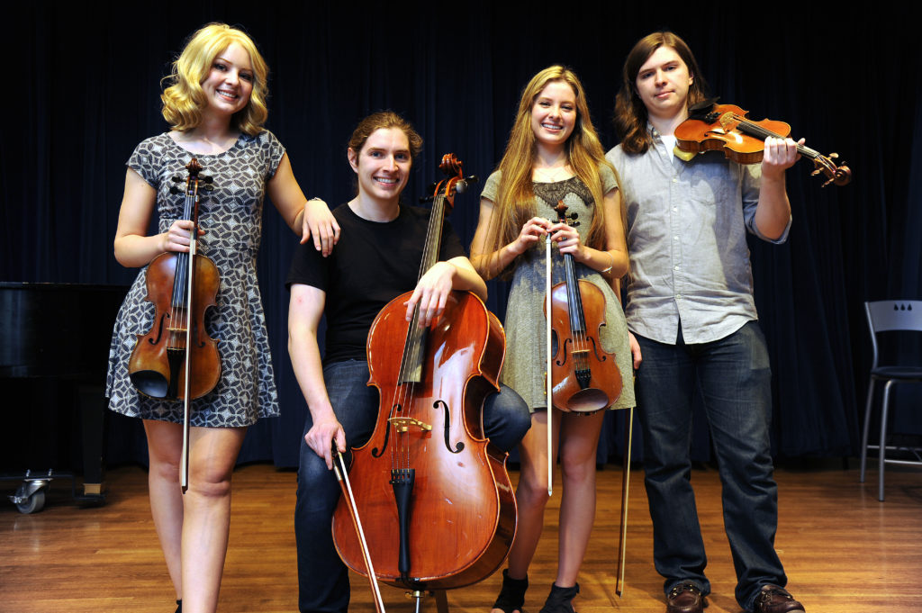 Siblings Kaylee, Luke, Kelsey and Zachary Payne make up a significant bloc of the UMW Philharmonic.