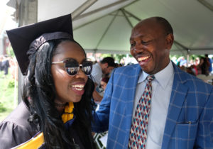 Economics major Purity Muthaa's father traveled more than 7,000 miles from Uganda to watch her graduate from the University of Mary Washington. Photo by Norm Shafer.