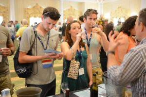 UMW alumni sample wine at last year's Reunion Weekend. The event features a Virginia wine and beer tasting.