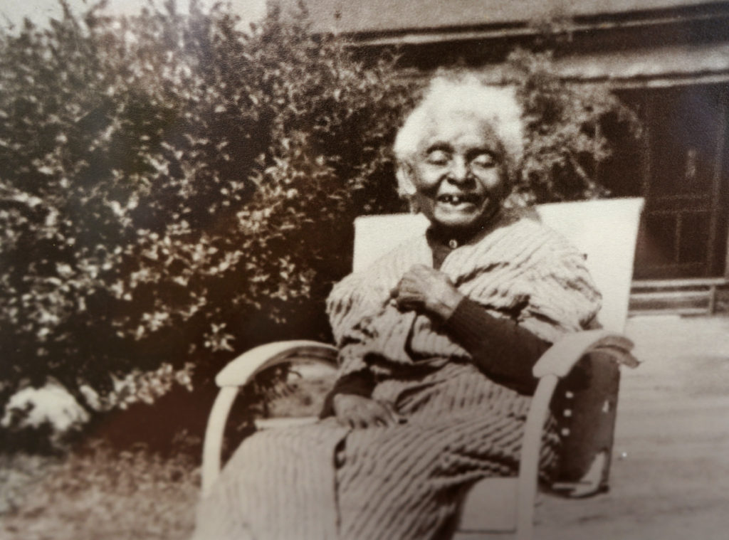 A photo of Mammy Cook, Johnny Johnson's childhood babysitter who'd been born into slavery in his native North Carolina, hangs in his Charles Street studio in Fredericksburg. She inspired his love of music.