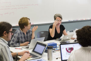 Muhlenberg College Assistant Professor of Media and Communication Kate Ranieri (left) talks with Diana Graizbord, a sociology professor at the University of Georgia, during DPL's Digital Storytelling course. Photo by Dave Ellis.