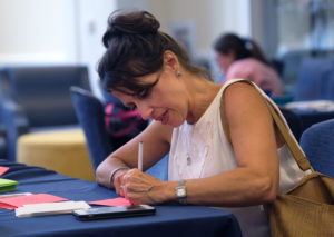 Parents of incoming UMW freshmen wrote letters to them during the Move-In Day First Letters Campaign for Parents and Families. Photo by Norm Shafer.