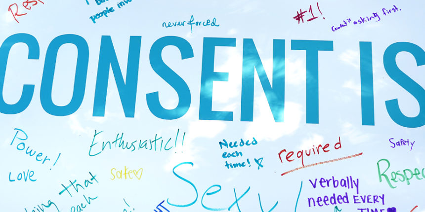 UMW students signed a consent poster in support of sexual assault awareness