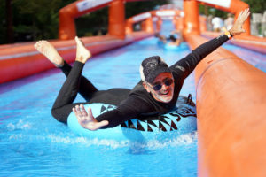 UMW President Troy Paino took the inaugural plunge on SlideFXBG during the Eagle Nation community event, hosted by Mary Washington Athletics. Photo by Suzanne Rossi.