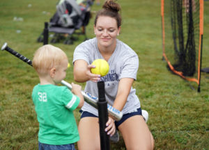 UMW student athletes share their sports, including softball, tennis, lacrosse and more, with area children each year during Eagle Nation Day. Photo by Suaznne Rossi.