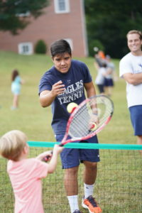 UMW student athletes share their sports, including softball, tennis, lacrosse and more, with area children each year during Eagle Nation Day. Photo by Suaznne Rossi.