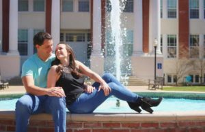 Biology majors Leah Roth ’16 and Chris Somerville ’14 pose by a fountain at Mary Washington. They plan a June wedding.