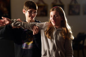 Siblings Daniel Kilmartin, 12, and Emily Kilmatin, 10, work together on a theatrical concept introduced in a recent workshop. Photo by Suzanne Rossi.