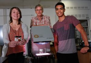 Professor and Chemistry Department Chair Charlie Sharpless with July Laszakovits '16 and Orlando Stewart Jr. '15. Photo by Norm Shafer.