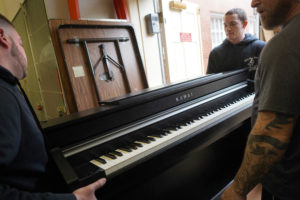 UMW acquired new pianos this week through a loan program with Kawai America Corporation. Photo by Suzanne Carr Rossi.