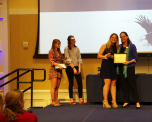 Junior Lillian Lester won the Prince Woodard Emerging Leader Award, presented by Juliette Landphair, vice president of Student Affairs. Photo by Noah Stroble.