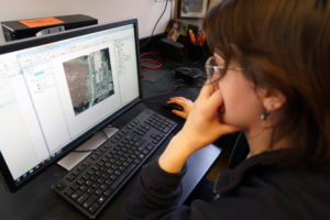 Senior historic preservation major Olivia Larson, also earning her GIS certificate at Mary Washington, is mapping the location of the artifacts UMW students collected at Aquia Creek. Photo by Suzanne Carr Rossi.