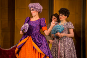 Victoria Fortune '20 (left) is Lady Fidget and Sarah Green '19 is Mistress Dainty Fidget in UMW's production of "The Country Wife." Jake Dodges '20 (background) plays Quack in the show, onstage at Klein Theatre through April 20. Photo by Geoff Greene.