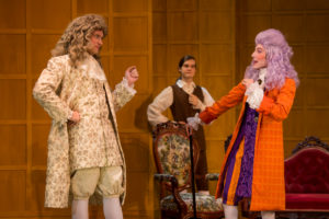 (Left to right) Stephen Nickens '19 plays Harry Horner, Nathan Marshak '22 plays Horner's manservant, and Tommy Kelleher '21 plays Sir Jasper Fidget in "The Country Wife," onstage at UMW through April 20. Photo by Geoff Greene.