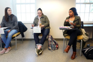 (Left to right) Kaitlyn McClung, Cailey Epperson and Maya Moore feel free to share their opinions during a chapter discussion based on a new textbook written by UMW professors Mindy Erchull and Miriam Liss, along with a colleague. Photos by Suzanne Carr Rossi.