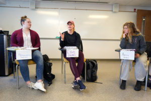 Alexandra Diviney and classmates NAME and NAME, participate in a recent session of Mindy Erchull's "Psychology of Women" class. A new textbook written by Erchull and fellow faculty member Miriam Liss includes up-to-date research and features current events and concept today's feminists can relate to. Photos by Suzanne Carr Rossi.