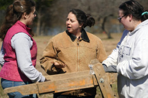 UMW sophomore Abigail Phelps discusses the day's findings with Assistant Professor of Historic Preservation Lauren McMillan at Aquia Creek. Photo by Suzanne Carr Rossi.