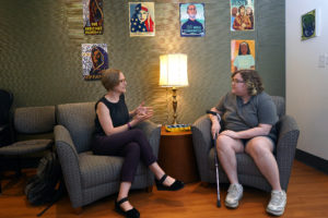 Ren Koloni (right) with their advisor, Associate Professor of Sociology Tracy Citeroni. At UMW, Koloni found supportive professors such as Citeroni who encouraged them in their research. Photo by Suzanne Carr Rossi.