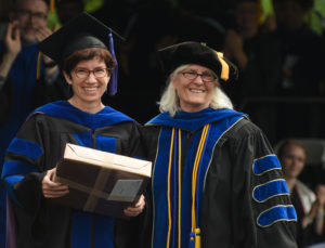 Leslie Martin, left, is the Grellet C. Simpson Award winner presented by Provost Nina Mikhalevsky.