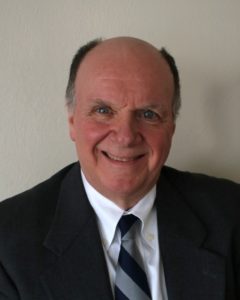Associate Professor of Business Louis Martinette 