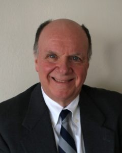 Associate Professor of Business Louis Martinette
