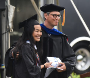 Jeremy Larochelle, recipient of the Mary W. Pinschmidt Award, poses with Class Vice President Nancy Pham. Photo by Clement Britt