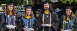 Sophia Josephine Lamp, Emily Lynn MacIndoe, Hollis E. Pultz and Lauren Marie Van Nostrand (left to right) received the Darden Award for the highest GPA. Photo by Clement Britt