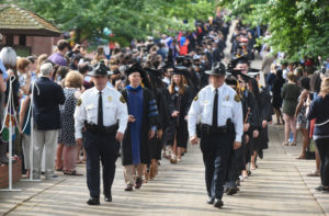 The procession began on Campus Walk at 9 a.m. under slightly overcast skies during UMW's 108th Commencement ceremony. Photo by Clem Britt.
