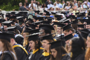 Undergrads about to receive their bachelor's degrees fill Ball Circle during the Saturday morning Commencement ceremony at UMW. Photo by Clem Britt.