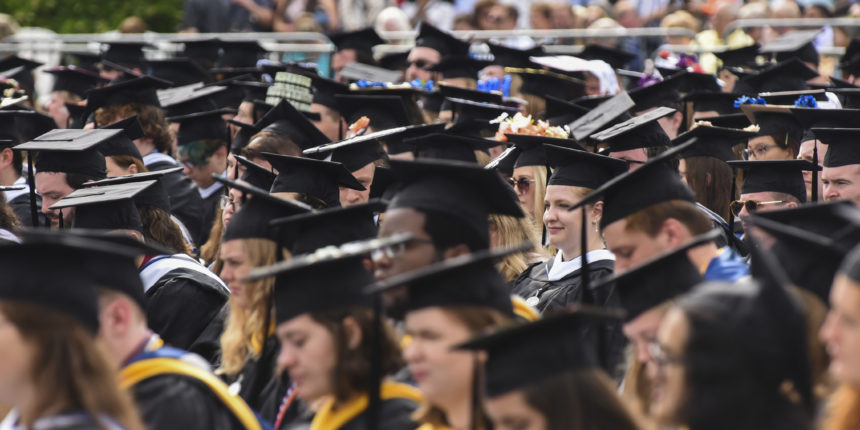 Undergrads about to receive their bachelor's degrees fill Ball Circle during the Saturday morning Commencement ceremony at UMW. Photo by Clem Britt.