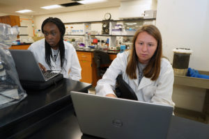 Incoming Mary Washington freshmen Abby Delapenha (left) and Meghan McLees are lab partners during this summer's five-week session for Jepson Scholars. The program is the brainchild of UMW professors Dianne Baker and Nicole Crowder, who said studies have shown that science students are more successful when they don’t have to work to pay tuition.