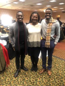 Nehemia Abel (R) with his brother, Alexander Abel, a George Mason University alumnus, with Sabrina Johnson, UMW's vice president for equity and access and chief diversity officer. Aided by StartUpUMW, the brothers founded their own nonprofit, UBUMWE, which helps local Burundian youth.