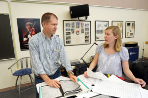 Kuykendall worked with UMW alumna Elyse Ridder, who graduated last May, to piece together a pirated version of Gilbert & Sullivan's 'H.M.S. Pinafore' by John Philip Sousa. Photo by Suzanne Carr Rossi.