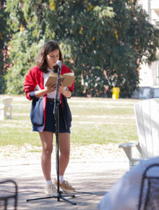 UMW sophomore Katia Savelyeva reads aloud from emily m. danforth's 'The Miseducation of Cameron Post.' Books like this involving LGBT characters or themes are frequent targets of censorship. Photo by Matthew Binamira Sanders.