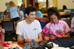 First-years make toys for sheltered dogs at the Center for Community Engagement's Day of Service. Photo by Suzanne Rossi. 