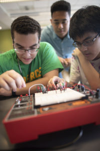 The Mason agreement includes graduate-level courses in applied information technology, computer science, data analytics engineering, operations research, statistics and systems engineering. The Virginia Tech agreement allows students to apply for early admission to the master of engineering program in computer science and applications as early as spring of their junior year. Photo by Evan Cantwell/George Mason University.