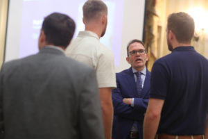 Pat Filippone '88, president of 7th Inning Stretch and this year's UMW College of Business Executive-in-Residence, speaks with a group of business students. Photos by Karen Pearlman.