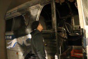 At the Birmingham Civil Rights Institute, the UMW group saw the Freedom Riders' bus, which was firebombed by the KKK in Anniston, Alabama on Mother's Day, May 14, 1961. The white mob held the doors to trap the riders inside and then brutally attacked them as they tried to escape the flames. Photo by Lynda Allen.