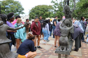 At Kelly Ingram Park in Birmingham, the UMW group paused for reflection at the sculpture memorializing the four little girls who were murdered in the 16th Street Baptist Church bombing in 1963. Photo by Lynda Allen.