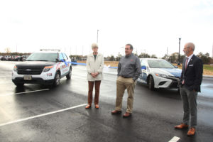 College Heights Civic Association President Meredith Beckett and City Council member Tim Duffy, a Mary Washington graduate and College Heights resident, attended Friday's ribbon cutting for the newly expanded parking lot at UMW's Battlefield Athletic Complex. Photo by Karen Pearlman.