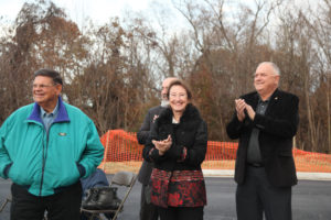From left to right, Travis Berry, Fredericksburg City Manager Tim Baroody, Mayor Mary Katherine Greenlaw and Assistant City Manager Doug Fawcett clap after Friday's ribbon cutting. Photo by Karen Pearlman.