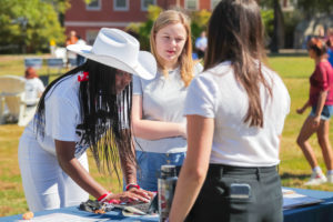 A student registers to vote at UMW's National Voter Registration Day event in September. Photo by Matthew Binamira Sanders.