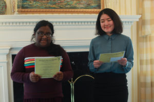 First-year Tanima Mullah (left) and Japanese Outreach Coordinator Minae Uehara read haikus in Japanese and English. Photo by Karen Pearlman.
