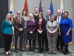 A number of people at both NSWCDD and UMW helped make the partnership possible. They included, left to right, back row: Ally Reagan, NSWCDD Human Resources Director; Captain Casey Plew, NSWCDD Commanding Officer; Darren Barnes, NSWCDD Technical Director (Acting); and Christian Clifford, NSWCDD Business Director. Left to right front row: Christy Pack, UMW Director of Graduate Admissions; Troy Paino, UMW President; Nina Mikhalevsky, UMW Provost; Julie Heflin, NSWCDD Academic Programs Manager; Lynne Richardson, UMW College of Business Dean; and Kimberly Young, Executive Director of UMW’s Continuing and Professional Studies. Photos by Bob Martin.