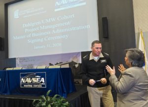 College of Business Dean Lynne Richardson chats with NSWCDD Commanding Officer Casey Plew. Photo by Robert A. Martin.