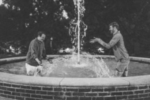 Evan Smallwood (left) and Aaron McPherson enjoy a uniquely Mary Washington perk - playing around in the Palmieri Fountain. The two wed on campus last year.