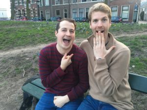 Aaron McPherson (right) looks surprised with Evan Smallwood's wedding proposal during a 10-day trip to Europe. McPherson later proposed, as well, at UMW's amphitheatre, where the two married.