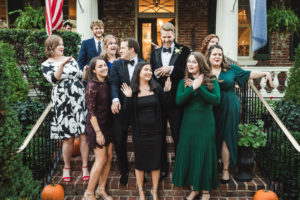 UMW alums pose here at Smallwood and McPherson's wedding reception. Clockwise from the back right are Miriam McCue '16. Sarah Campbell '16. Quinn Doyle '16 (who officiated), Lula Sargent '15, Luisa Dispenzirie '12, Ray Celeste Tanner '16, Quinn Nolan (who transfered from UMW) and Kelly Caldwell '10. UMW alums who also attended the wedding last year include Lindsay McPherson London '06 and Molly Beavers Carr '88.