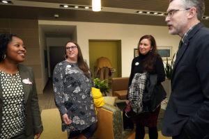 UMW Registrar Rita Dunston, Admissions' Sarah Lindberg, Director of Undergraduate Admissions Melissa Yakabouski and Chief of Staff Jeff McClurken chat at UMW's Dahlgren Campus. Photos by Suzanne Carr Rossi.