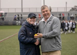 As head coach, Catullo (shown here with UMW Head Women's Lacrosse Coach Caitlin Moore) advanced the women's tennis team to 14 conference chamionships and 14 NCAA Tournament appearances.